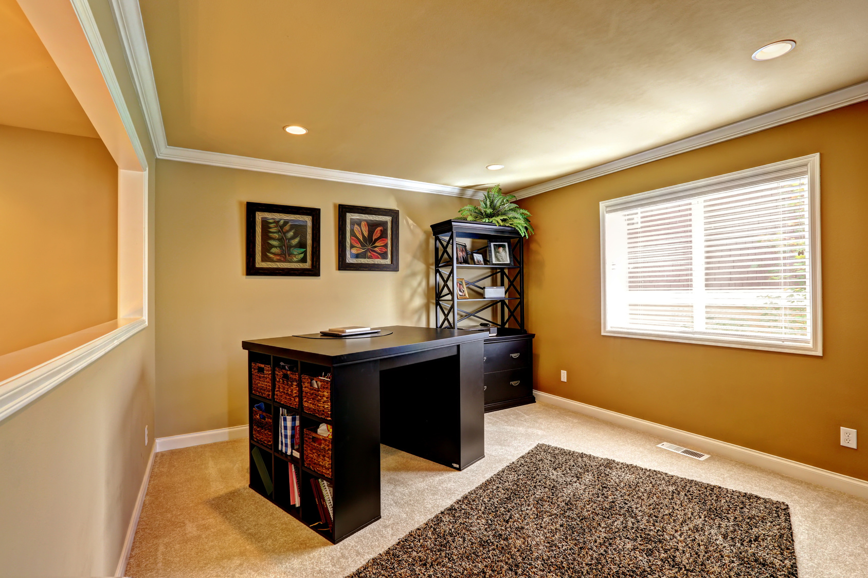 Office area with dark brown furniture Choice Windows & Doors